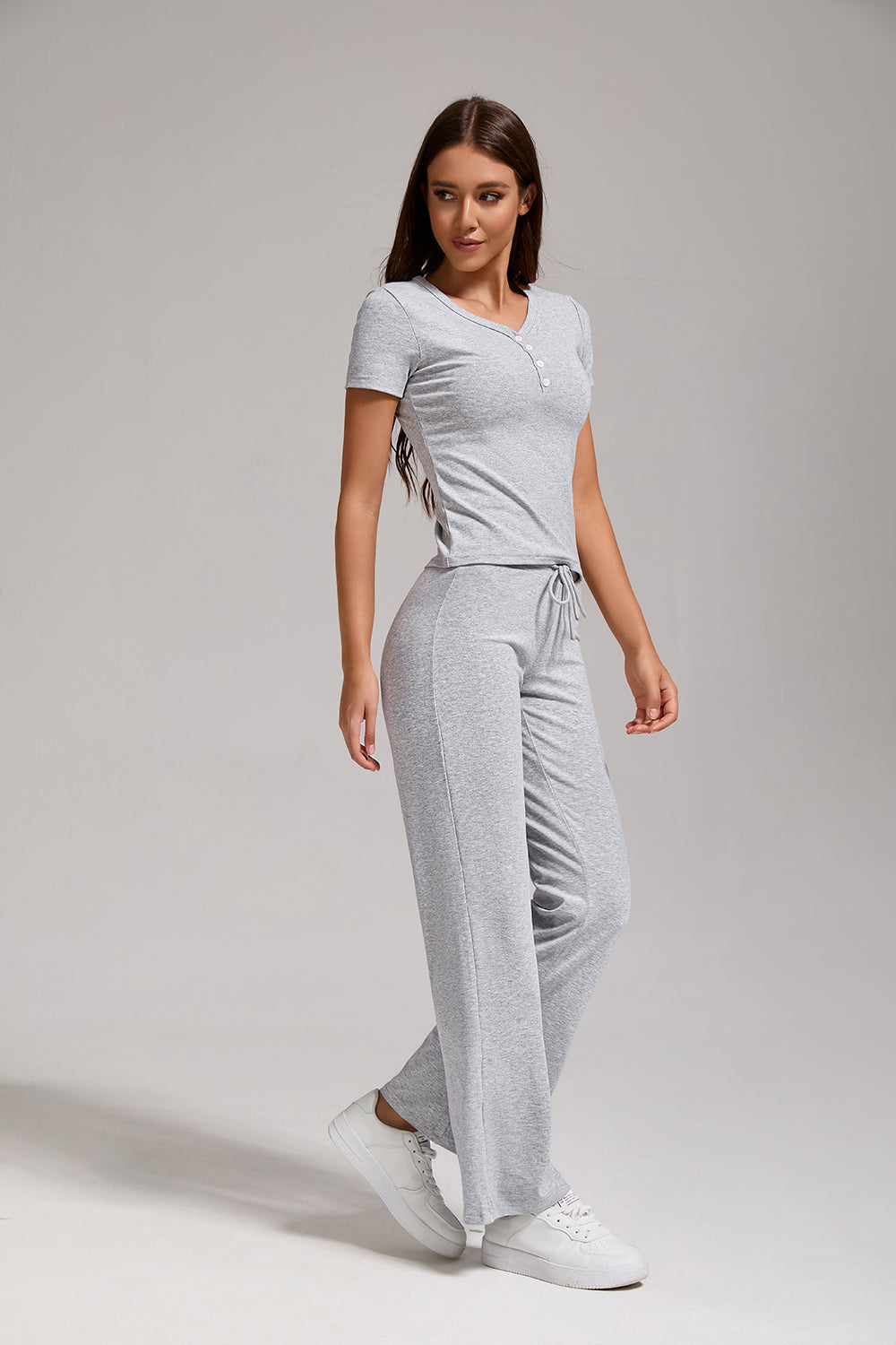 Women's Casual Sports Two-piece Set With V-neck Button, Short Sleeved, Low Waisted Flared Pants, Sportswear